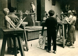 Sculpture life room c. 1955, right to left- Reid Moffat,  sculpture of trumpet player by Alan Fletcher  - Sheila McLaughlin back to us, Eleanor Christie (furthest away), Benno Schotz and Janie Alston.
Big Jimmy, the model.